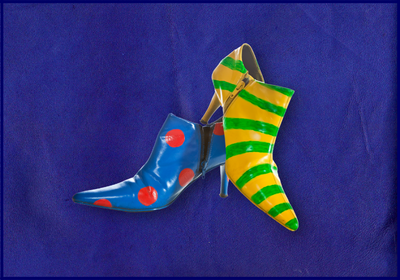Pointed heeled booties in brightly coloured stripes and polka dots